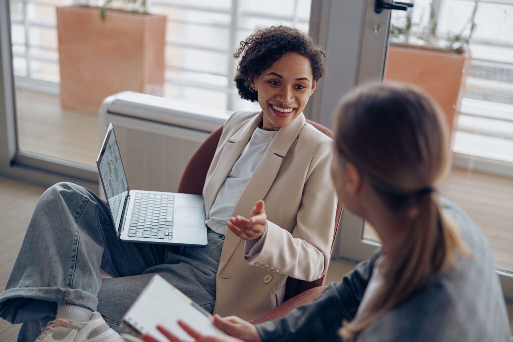 Case Study Component Hero Image of Two Women Talking